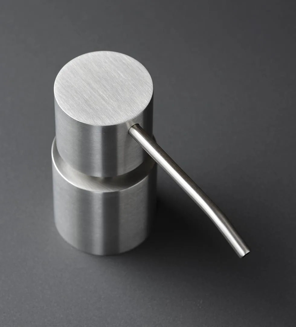 Deck mounted soap dispenser in brushed 316L stainless steel