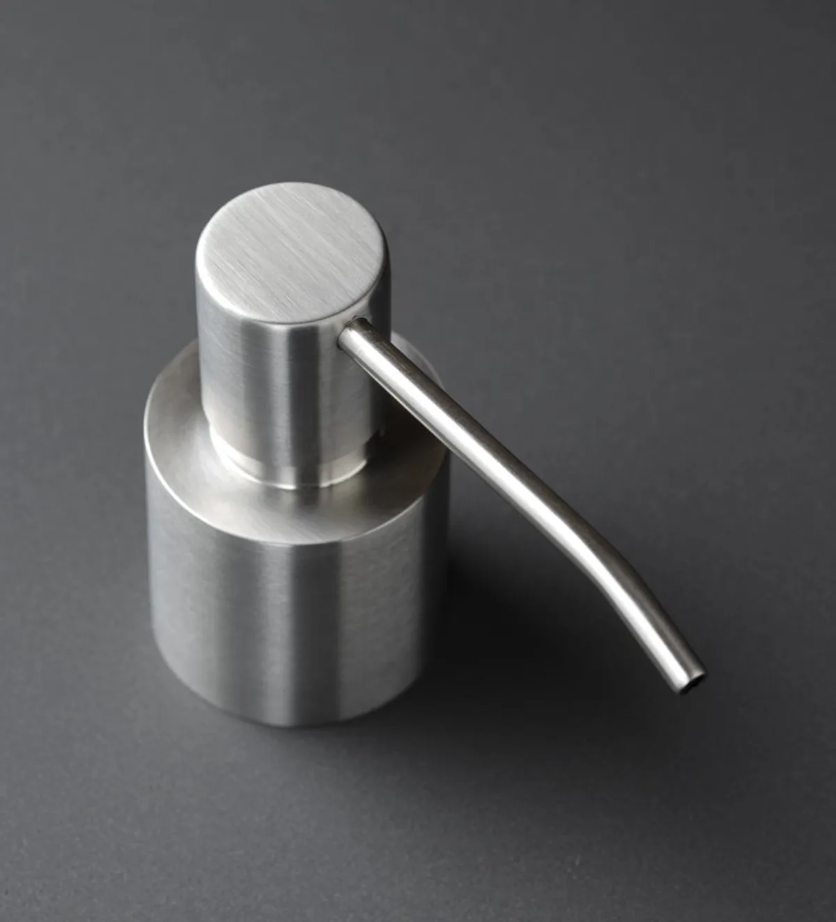 Deck mounted stainless steel soap dispenser in AISI 316L
