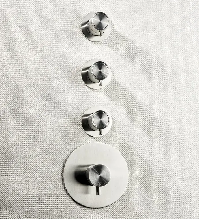 Concealed thermostatic shower set with three shut-off valves in brushed AISI 316L stainless steel